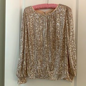 Never worn beautiful sparkling gold sequin top.